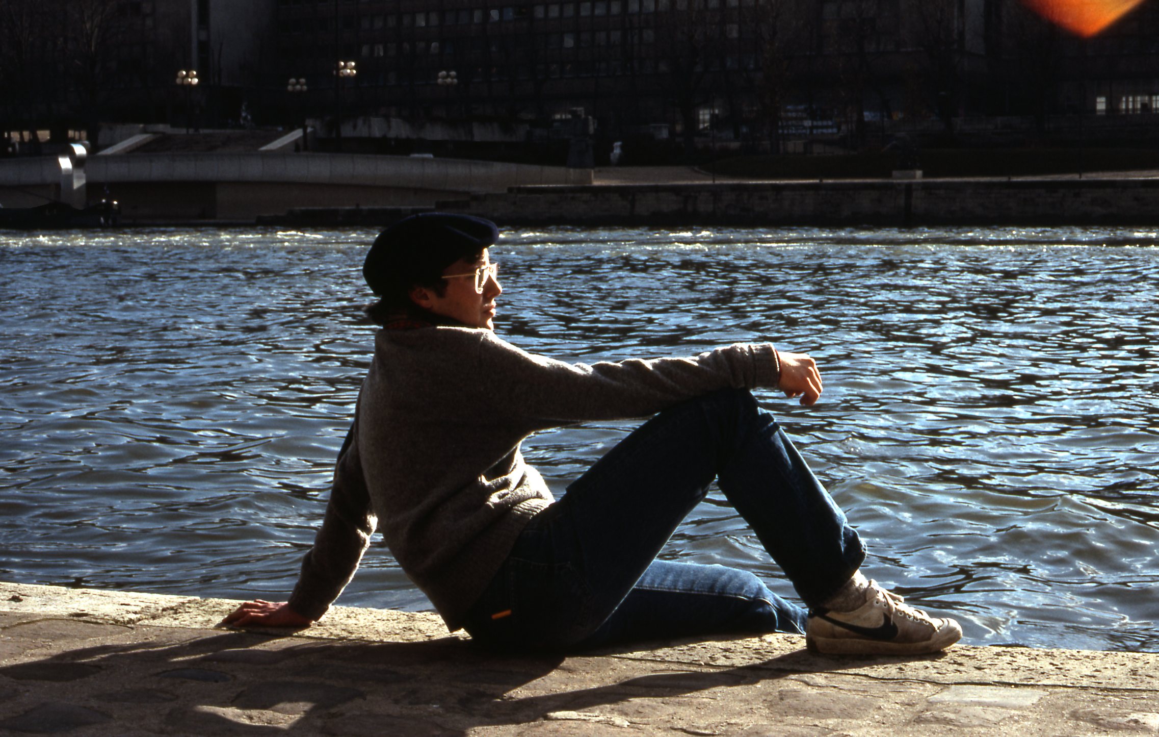 young man on banks of Seine